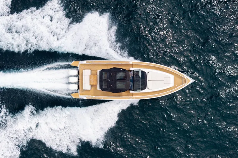 Slide: The Image of Aerial view of 2021 Pardo Yachts 38 cruising on open water. - 47