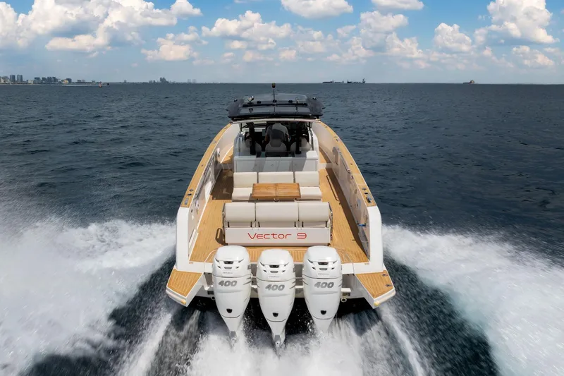 Slide: The Image of 2021 Pardo Yachts 38 cruising on open water with triple 400 engines. - 59