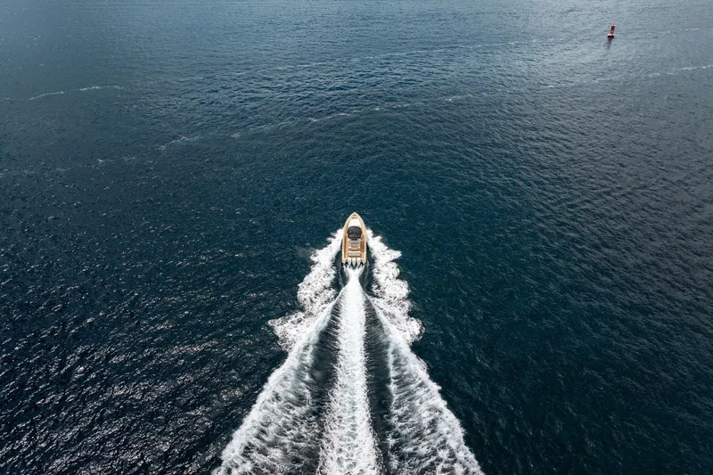 Slide: The Image of Aerial view of 2021 Pardo Yachts 38 cruising on open water. - 63