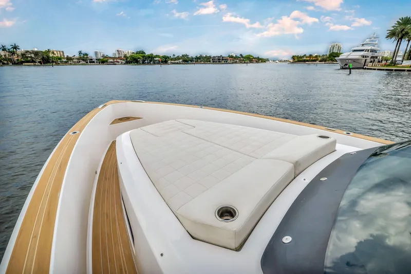 Slide: The Image of Pardo Yachts 38 (2021) with luxurious deck, cruising on a scenic waterway. - 8