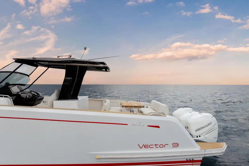Slide: The Image of Pardo Yachts 38, 2021 model, cruising on open sea under a vibrant sky. - 9