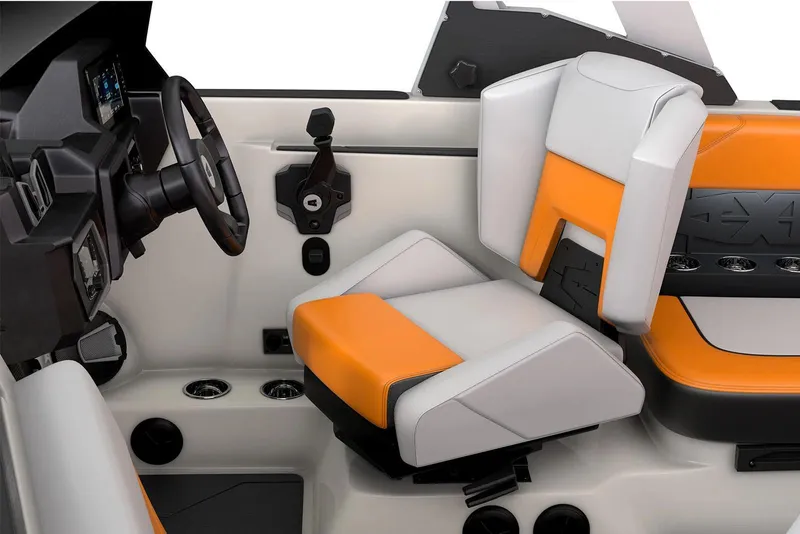 Slide: The Image of Manufacturer Provided Image: 2026 Axis A20 boat interior with orange and white seating, steering wheel, and control panel. - 2