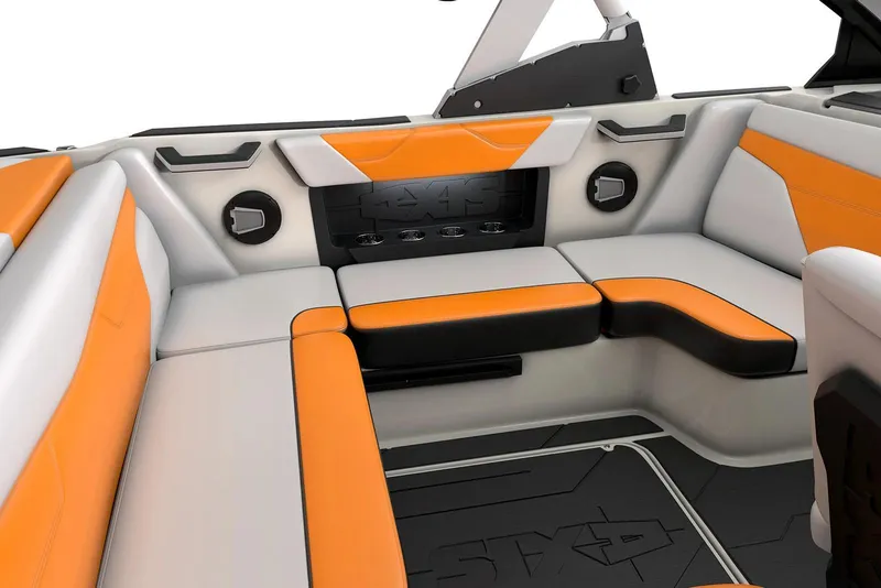 Slide: The Image of Manufacturer Provided Image: 2026 Axis A20 boat interior with orange and gray seating, featuring built-in speakers. - 4
