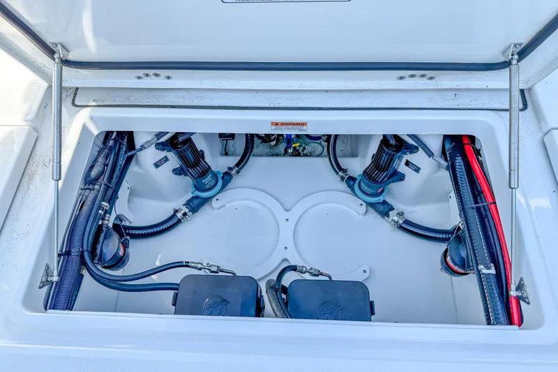 Slide: The Image of 2023 Blackfin 302 CC boat compartment with wiring and components. - 20