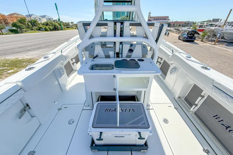 Slide: The Image of 2023 Blackfin 302 CC boat interior with fishing station and storage compartments. - 23