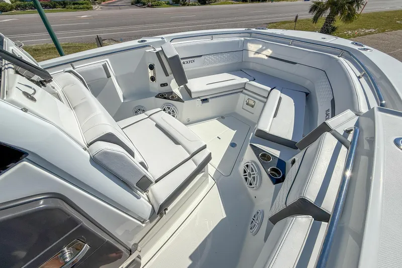 Slide: The Image of Luxurious seating area on 2023 Blackfin 302 CC boat, featuring modern design and comfort. - 35