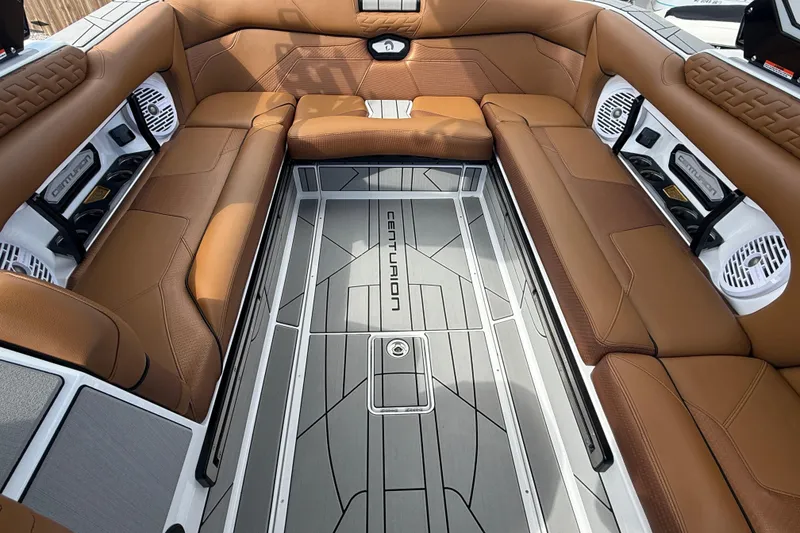 Slide: The Image of Luxurious interior of 2026 Centurion Ri245 boat with brown seating and modern design. - 14