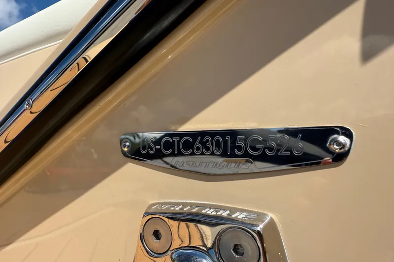 Slide: The Image of 2026 Nautique Super Air Nautique S23 hull identification number plate. - 8