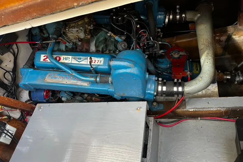 Slide: The Image of Engine of a 1967 Chris-Craft 31 Commander, showcasing 210 HP power unit. - 37