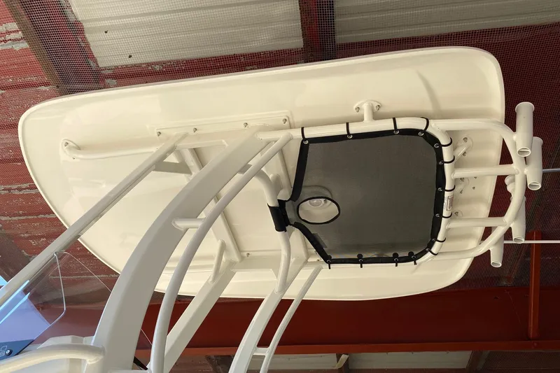 Slide: The Image of 2026 Boston Whaler 220 Dauntless T-top structure viewed from below. - 3