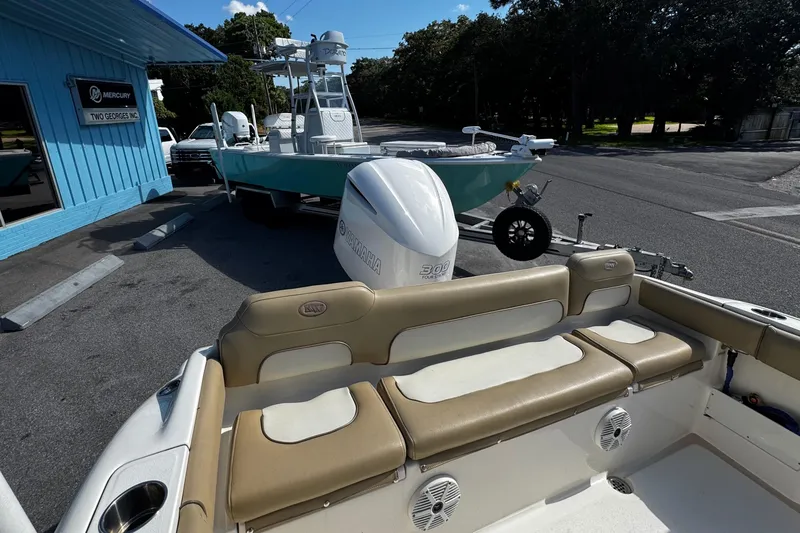 Slide: The Image of 2018 Key West 239 FS boat with Yamaha engine at dealership parking lot. - 21