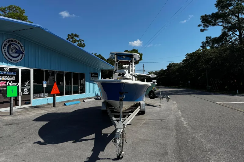 Slide: The Image of 2018 Key West 239 FS boat on trailer outside Two Georges Marina. - 9