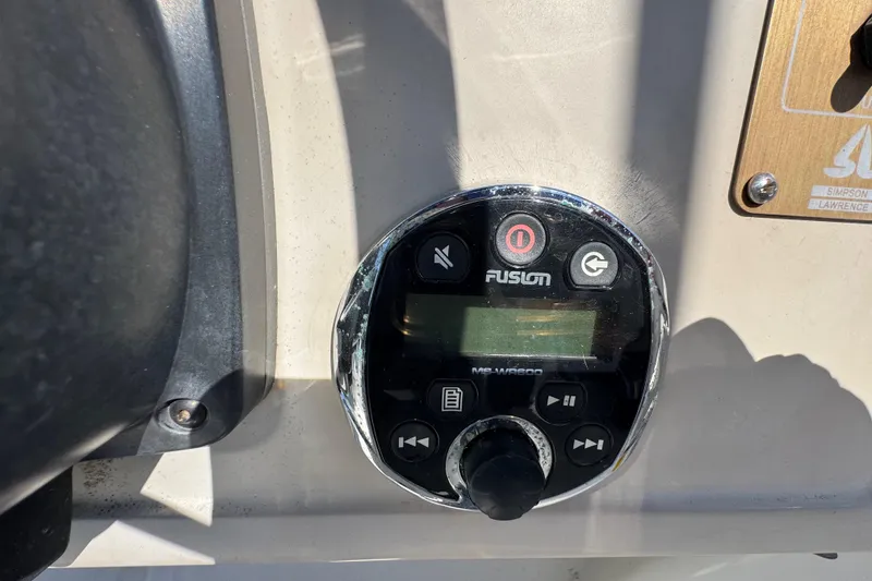 Slide: The Image of Close-up of Fusion marine stereo control panel on a 2000 World Cat 246 DC boat. - 18