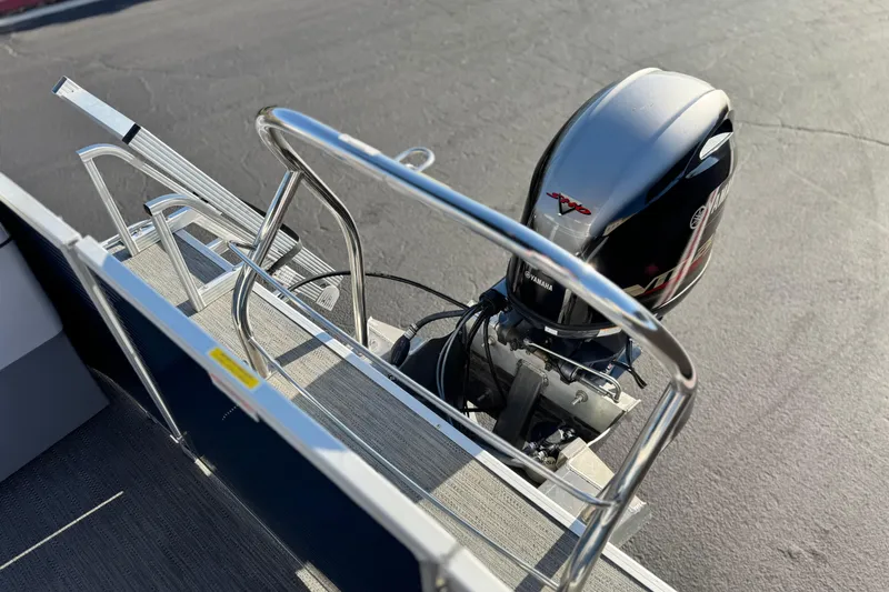 Slide: The Image of 2022 Godfrey SWEETWATER 2086 boat with Yamaha outboard motor and metal railing. - 18