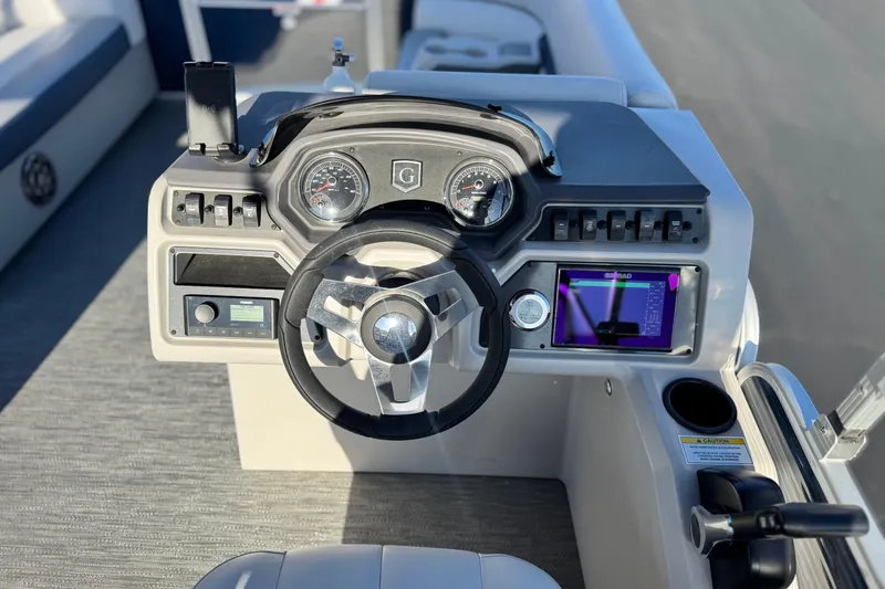 Slide: The Image of Steering console of 2022 Godfrey SWEETWATER 2086 pontoon boat with modern controls. - 20