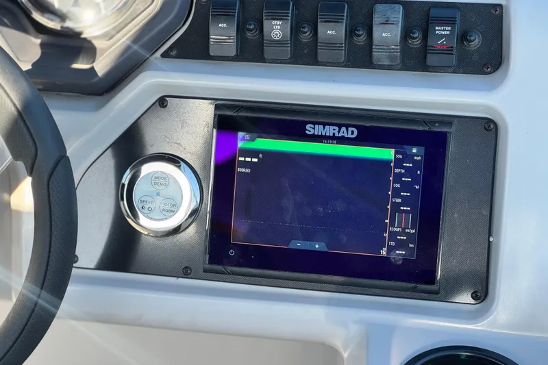 Slide: The Image of Dashboard of 2022 Godfrey SWEETWATER 2086 with Simrad display and controls. - 22