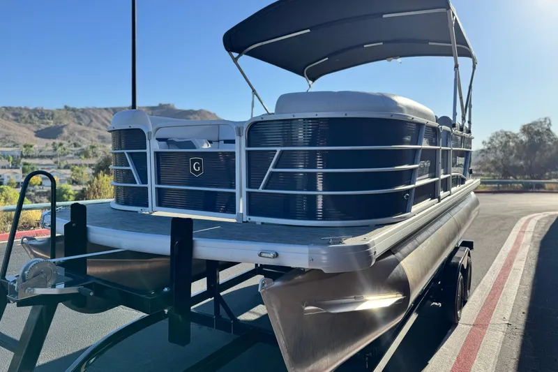 Slide: The Image of 2022 Godfrey SWEETWATER 2086 pontoon boat on trailer, scenic background. - 3