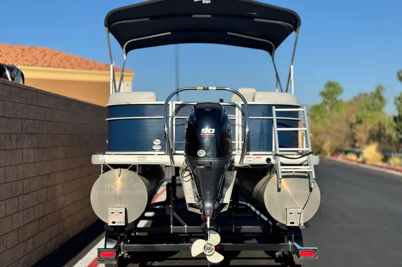 Slide: The Image of 2022 Godfrey SWEETWATER 2086 pontoon boat with outboard motor on trailer. - 4