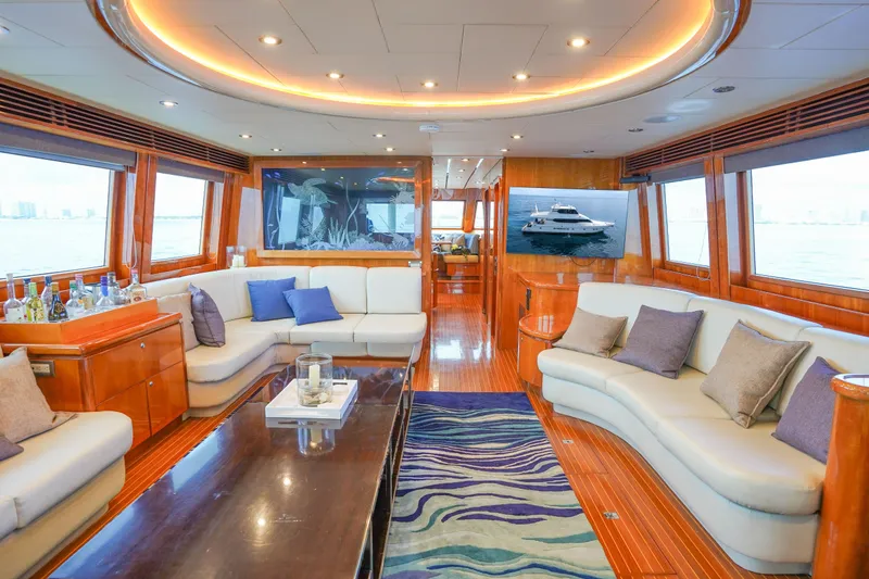 Slide: The Image of Luxurious interior of 2001 Monte Fino 82MY yacht with elegant seating and decor. - 21