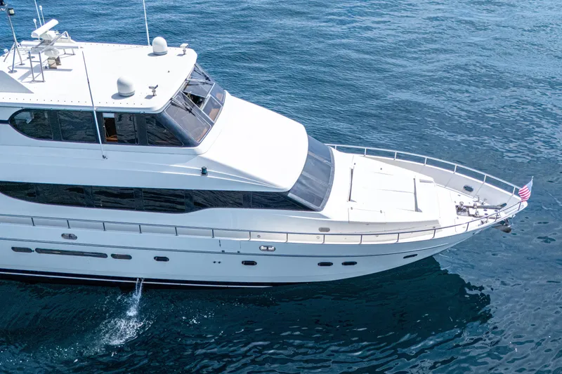 Slide: The Image of Luxury 2001 Monte Fino 82MY yacht cruising on open water. - 4