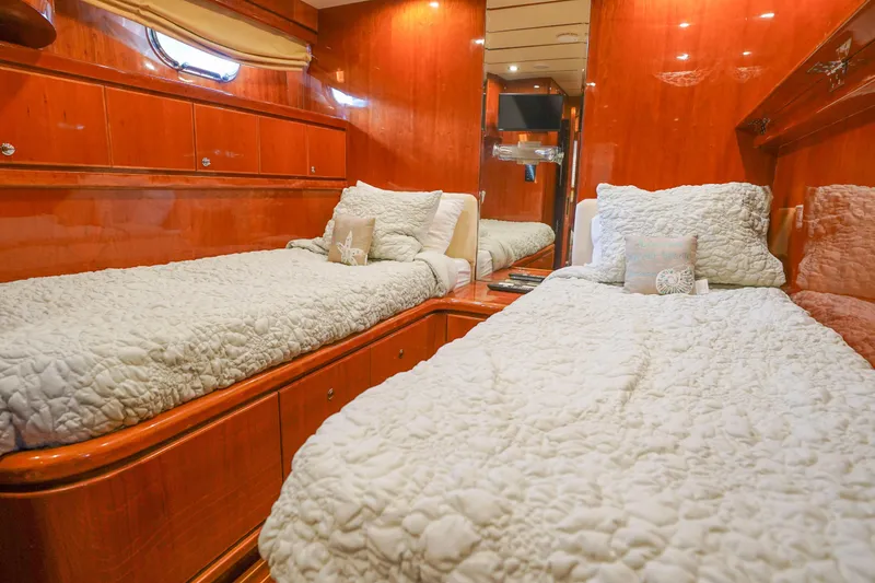 Slide: The Image of Luxurious bathroom on 2001 Monte Fino 82MY yacht with elegant wood finish and modern amenities. - 42