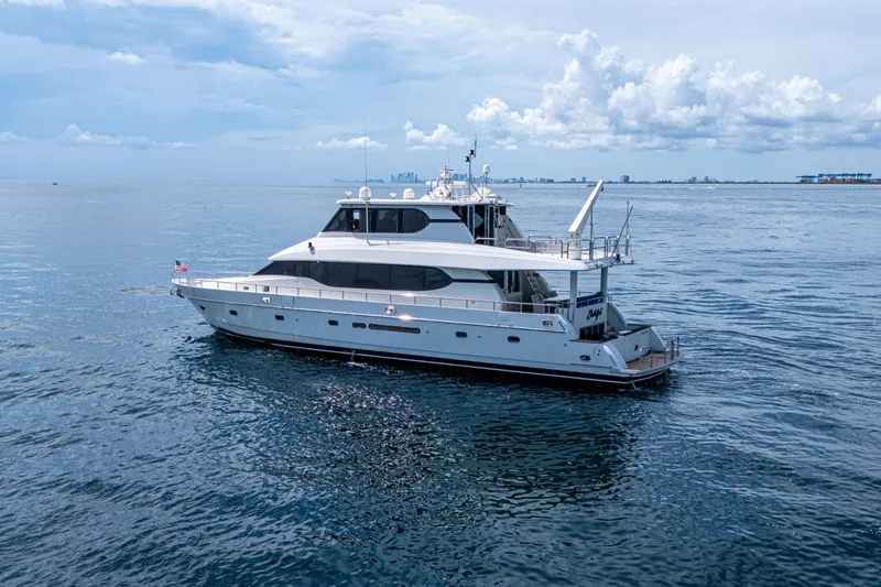 Slide: The Image of Luxury 2001 Monte Fino 82MY yacht cruising on calm ocean waters. - 7