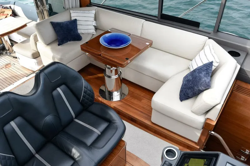 Slide: The Image of Luxurious interior of 2022 Princess V50 yacht with plush seating and elegant decor. - 11