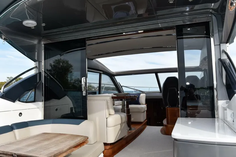Slide: The Image of Luxurious 2022 Princess V50 yacht interior with elegant seating and modern design. - 12