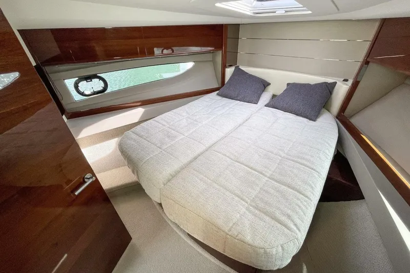 Slide: The Image of Luxurious cabin interior of 2022 Princess V50 yacht with cozy bedding and modern design. - 19