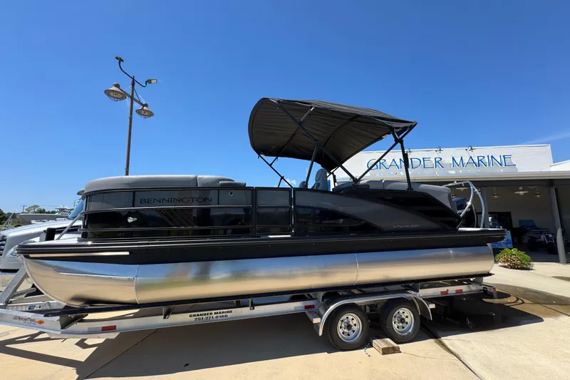 Slide: The Image of 2026 Bennington 22 MFB pontoon boat on trailer at Grander Marine dealership. - 16