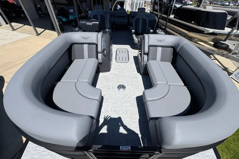 Slide: The Image of 2026 Bennington 22 MFB pontoon boat with spacious gray seating and modern design. - 18