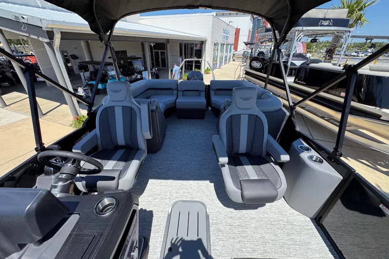 Slide: The Image of 2026 Bennington 22 MFB pontoon boat interior with plush seating and modern design. - 21
