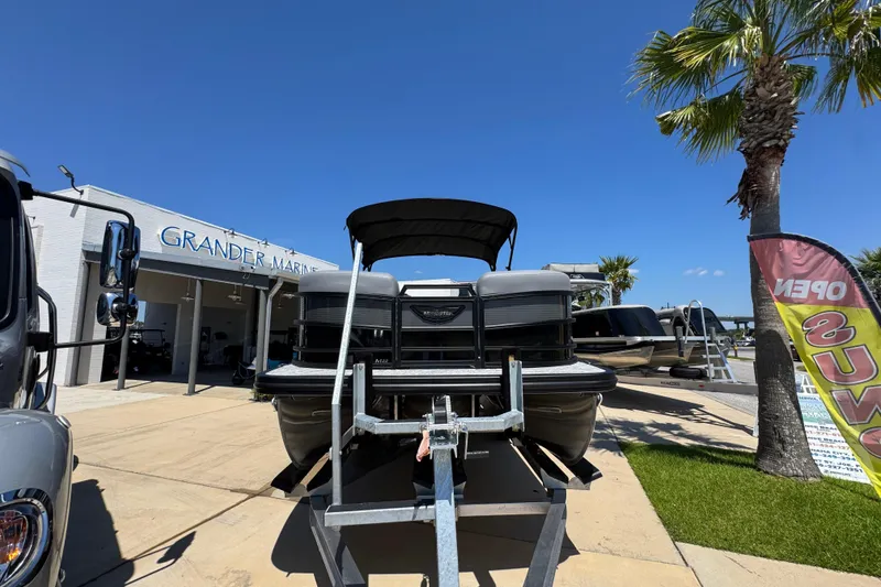 Slide: The Image of 2026 Bennington 22 MFB boat displayed at Grander Marine dealership. - 5