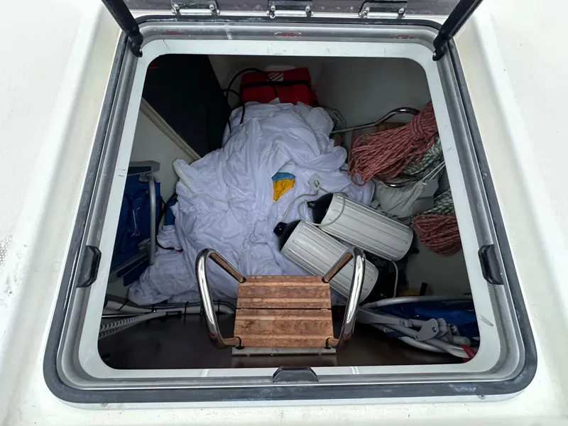 Slide: The Image of Storage compartment of 2020 Bavaria C50 yacht with ropes and equipment. - 16