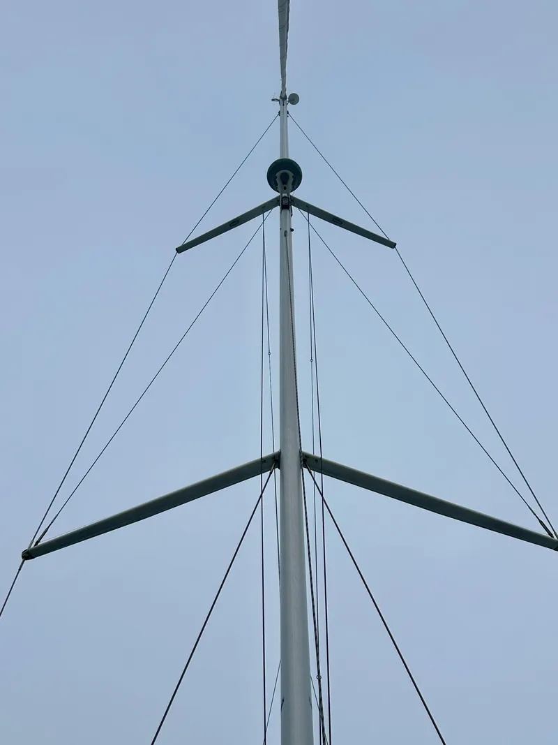 Slide: The Image of Mast of 2020 Bavaria C50 sailboat against a clear sky. - 20