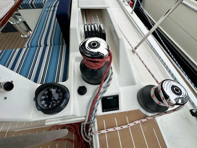 Slide: The Image of Cockpit of 2020 Bavaria C50 yacht with winches and navigation instruments. - 33