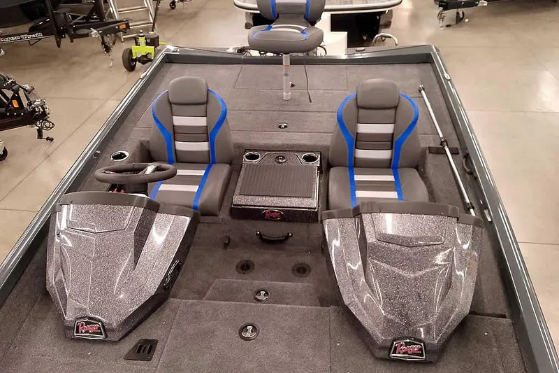 Slide: The Image of 2026 Ranger RT198P boat interior with dual seats and steering console. - 19