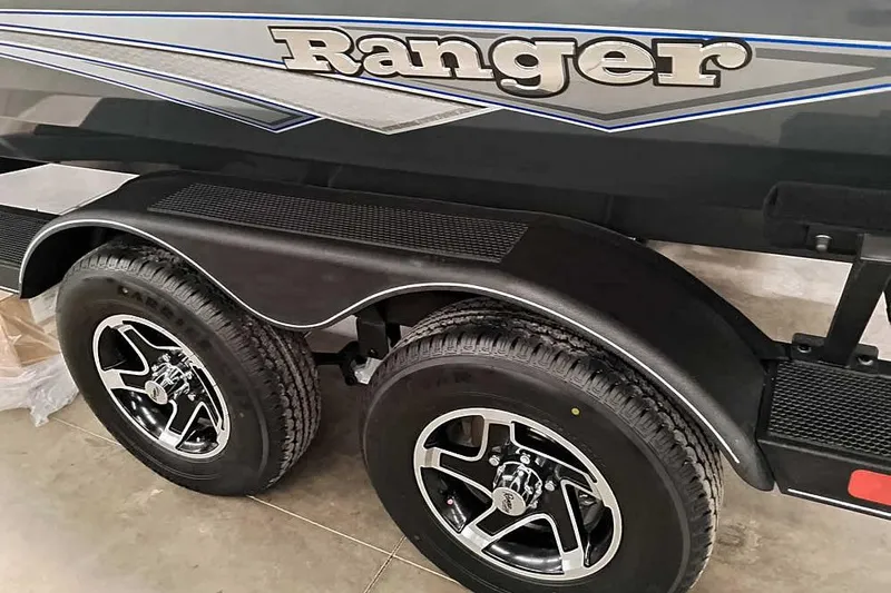 Slide: The Image of 2026 Ranger RT198P boat trailer with dual wheels and sleek design. - 9
