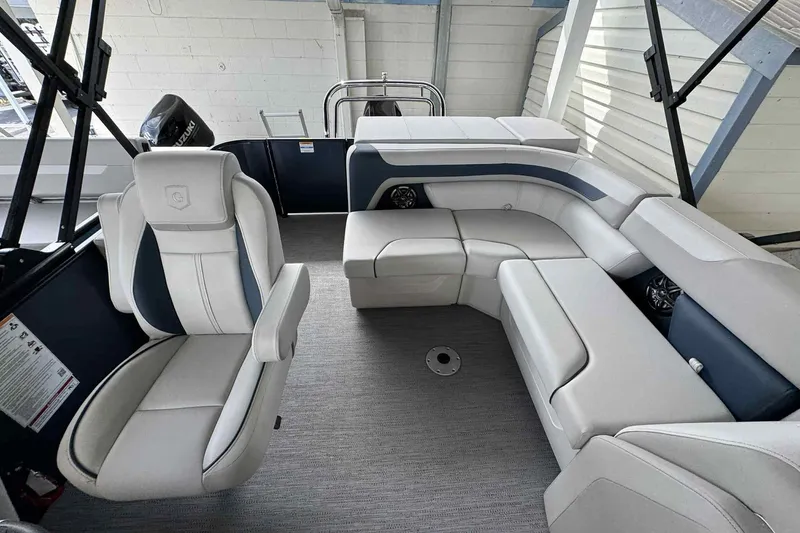 Slide: The Image of Interior of 2025 Sweetwater 2086 CSE boat with modern seating and sleek design. - 3