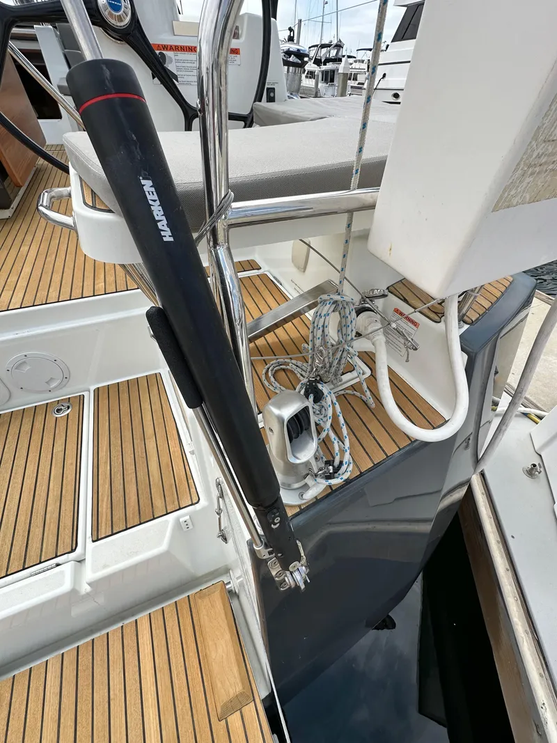 Slide: The Image of 2018 Jeanneau 54 yacht deck with teak flooring and Harken equipment. - 26