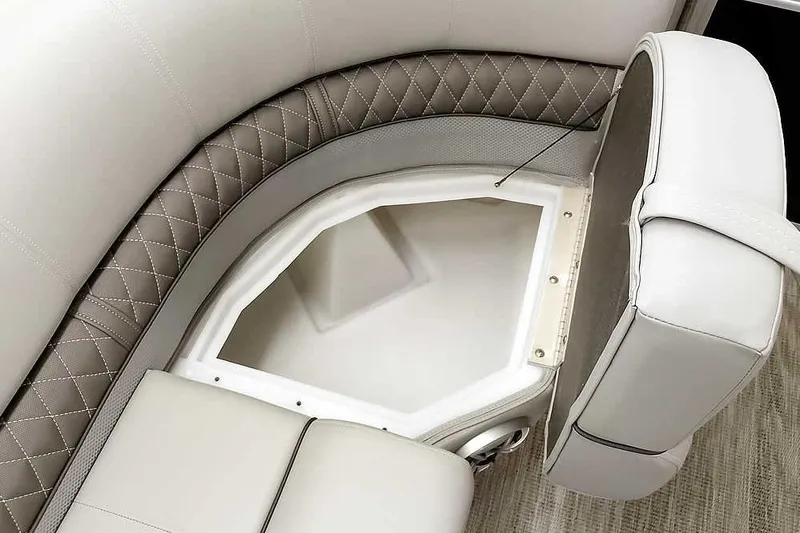 Slide: The Image of 2024 Ranger Reata 223C boat seat with storage compartment, featuring elegant diamond stitching. - 25