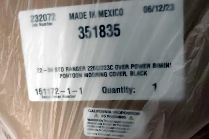 Slide: The Image of Label on Ranger Reata 223C 2024 pontoon mooring cover, made in Mexico, black. - 27