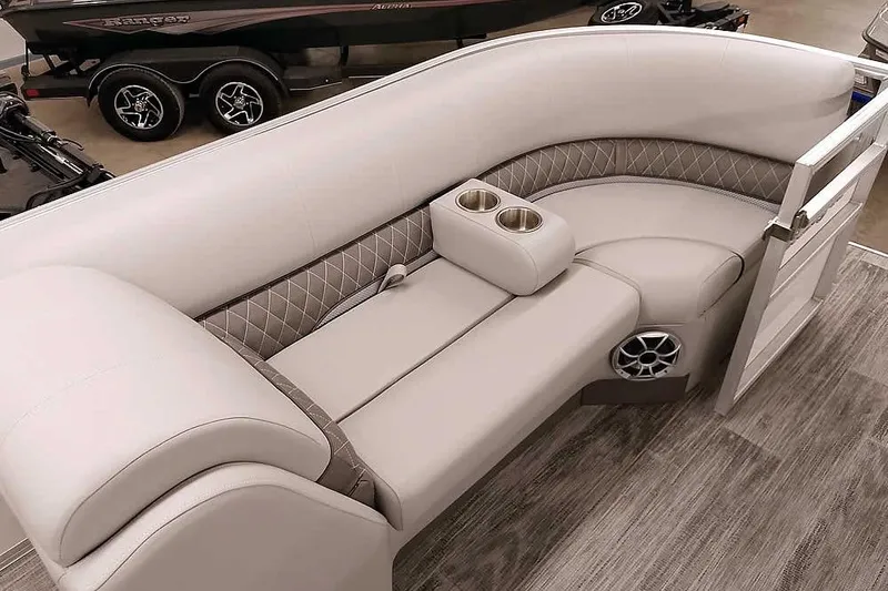 Slide: The Image of Luxurious seating on 2025 Ranger Reata 220C boat with cup holders and speaker. - 19