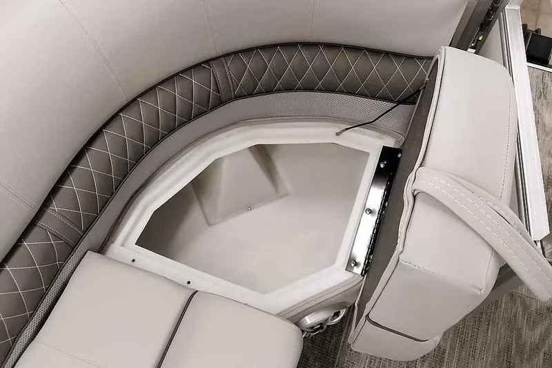 Slide: The Image of 2025 Ranger Reata 220C boat seat with storage compartment, featuring elegant diamond stitching. - 23