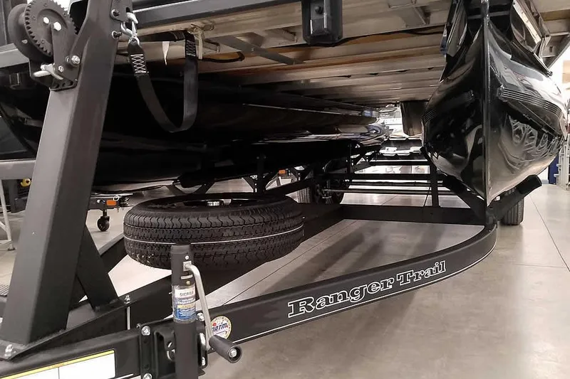 Slide: The Image of 2025 Ranger Reata 220C boat on Ranger Trail trailer, underside view. - 27