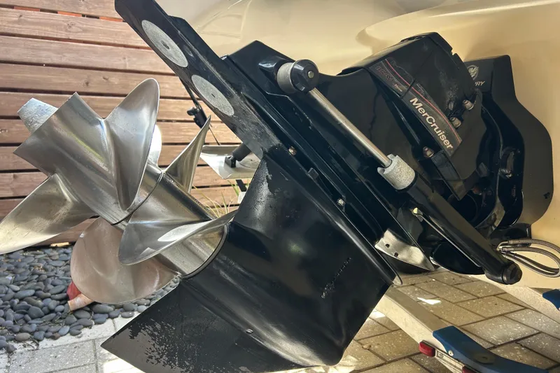 Slide: The Image of Close-up of 2007 Sea Ray 240 Sundancer MerCruiser engine and propeller. - 12