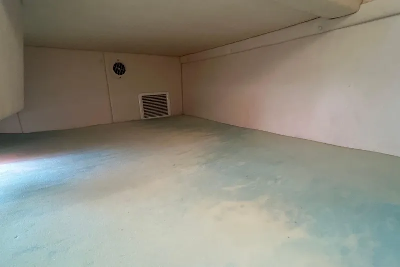 Slide: The Image of Interior cabin space of 2007 Sea Ray 240 Sundancer boat, featuring ventilation. - 23