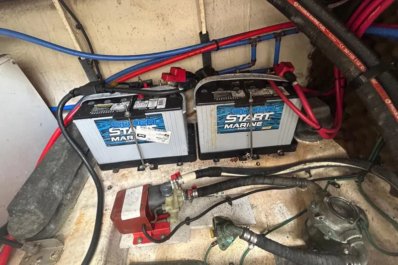 Slide: The Image of Marine batteries in a 2007 Sea Ray 240 Sundancer engine compartment. - 33