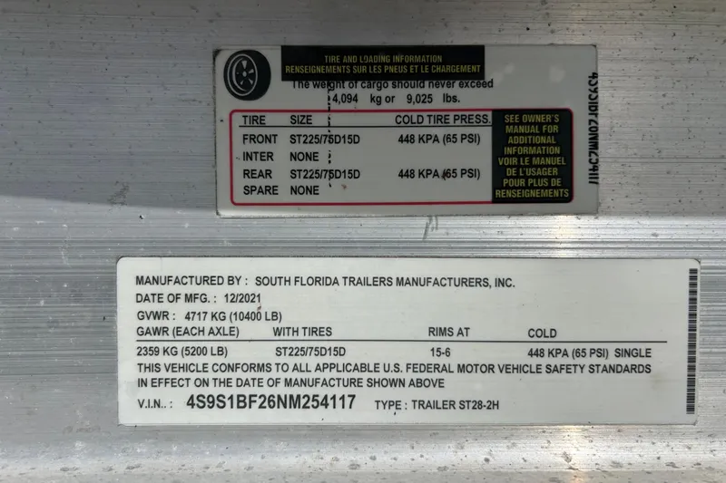 Slide: The Image of 2007 Sea Ray 240 Sundancer tire and loading information label, manufactured by South Florida Trailers. - 47