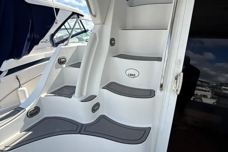 Slide: The Image of Staircase on a 2005 Carver 36 Sedan yacht, featuring sleek design and modern accents. - 48